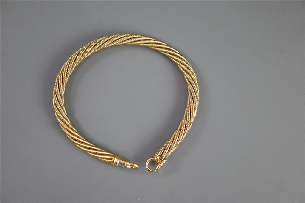 A Wellendorf 18ct. gold cable twist link bracelet with diamond set clasp,